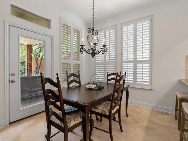 6301 Bermuda Dunes Dr, Plano, TX 75093 - dining room with a chandelier and ornamental molding