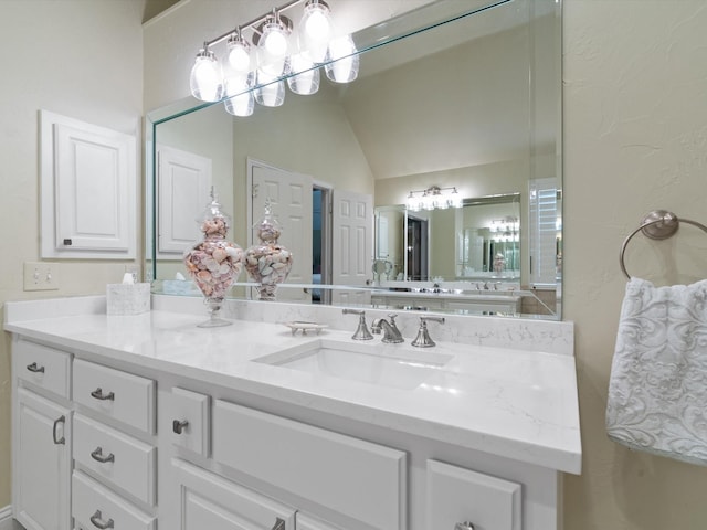6301 Bermuda Dunes Dr, Plano, TX 75093 - bathroom with vanity and vaulted ceiling