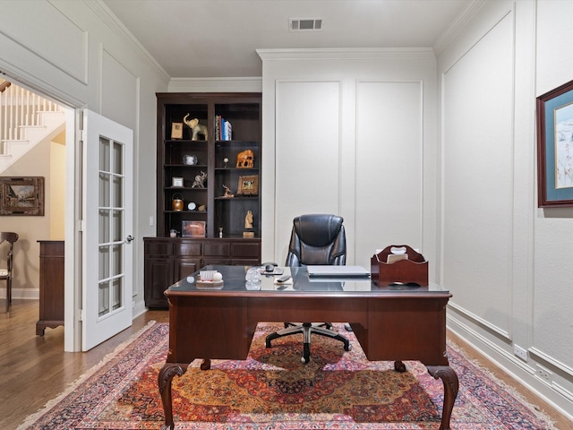 6301 Bermuda Dunes Dr, Plano, TX 75093 - office area with wood finished floors and crown molding