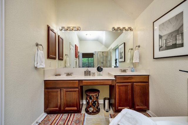 9708 Sinclair St, Fort Worth, TX 76244 - full bath with vaulted ceiling, double vanity, an enclosed shower, and tile patterned floors