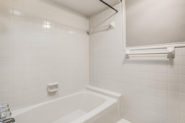 10630 Sandpiper Ln, Dallas, TX 75230 - full bath featuring tile walls and bathtub / shower combination