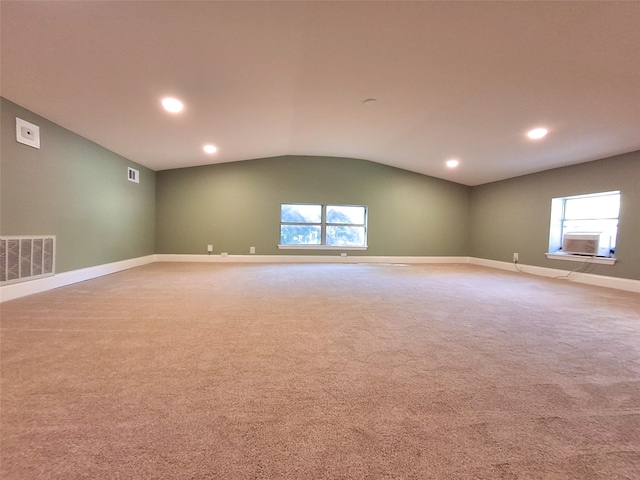 3717 W Spurgeon St, Fort Worth, TX 76133 - empty room featuring plenty of natural light, carpet floors, vaulted ceiling, baseboards, and cooling unit