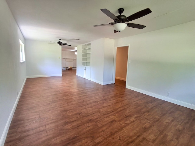 3717 W Spurgeon St, Fort Worth, TX 76133 - spare room featuring a ceiling fan, dark wood-style floors, and baseboards