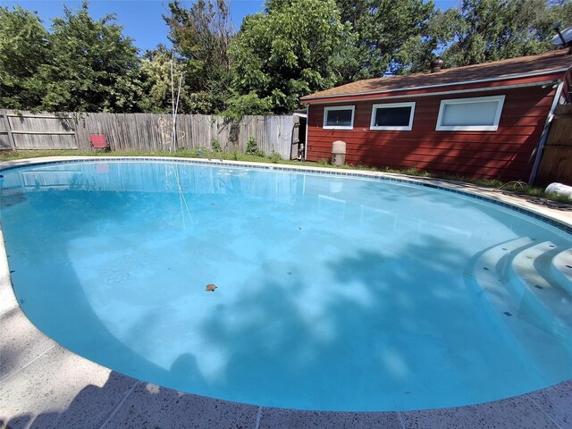 3717 W Spurgeon St, Fort Worth, TX 76133 - view of swimming pool featuring a fenced backyard and view of scattered trees