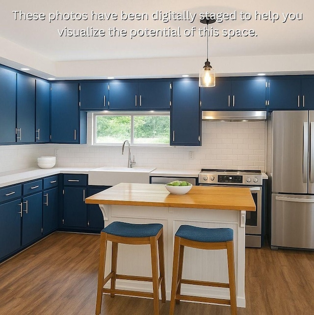3717 W Spurgeon St, Fort Worth, TX 76133 - kitchen with appliances with stainless steel finishes, blue cabinetry, a sink, ventilation hood, and a breakfast bar area