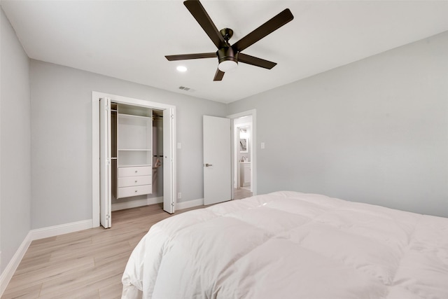 228 Harrison Ln, Hurst, TX 76053 - bedroom with baseboards, light wood-style flooring, a ceiling fan, recessed lighting, and a closet