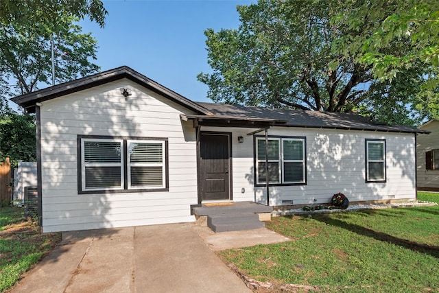 228 Harrison Ln, Hurst, TX 76053 - view of front facade with a front yard