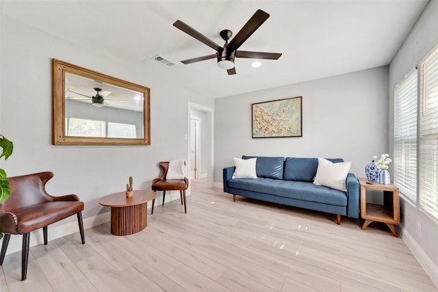 228 Harrison Ln, Hurst, TX 76053 - sitting room featuring a ceiling fan, healthy amount of natural light, light wood finished floors, baseboards, and recessed lighting