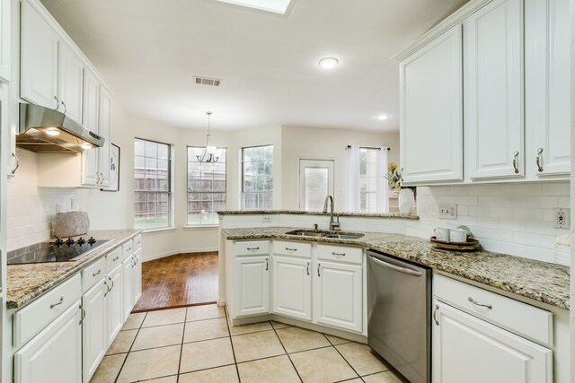 2001 Bosbury Dr, Flower Mound, TX 75028 - kitchen featuring freestanding refrigerator, white cabinetry, ceiling fan, recessed lighting, and light stone countertops