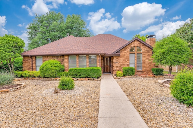 7581 Kings Ridge Rd, Frisco, TX 75035 - ranch-style home featuring brick siding, a chimney, and a shingled roof
