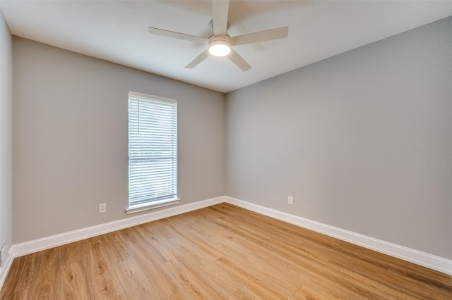 7581 Kings Ridge Rd, Frisco, TX 75035 - unfurnished room featuring light wood-style flooring, baseboards, and a ceiling fan