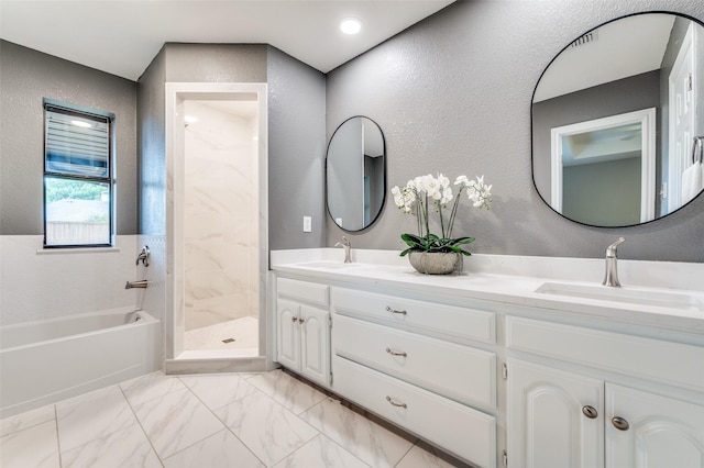 7581 Kings Ridge Rd, Frisco, TX 75035 - full bathroom featuring double vanity, a bath, a textured wall, walk in shower, and marble finish flooring