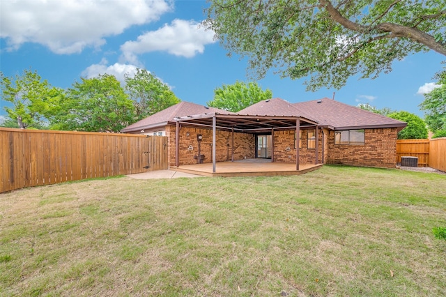 7581 Kings Ridge Rd, Frisco, TX 75035 - rear view of property with central air condition unit, a patio area, and brick siding