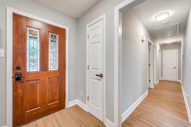7581 Kings Ridge Rd, Frisco, TX 75035 - entryway featuring light wood-type flooring and baseboards