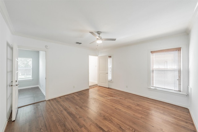 8726 San Fernando Way, Dallas, TX 75218 - empty room featuring wood finished floors, ornamental molding, ceiling fan, and baseboards