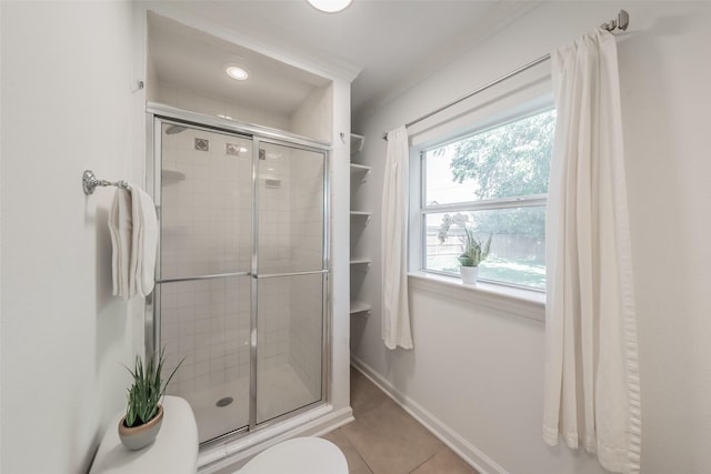 8726 San Fernando Way, Dallas, TX 75218 - full bath featuring a shower stall, tile patterned flooring, baseboards, and toilet