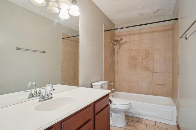 317 Stately Oak Ln, Lake Dallas, TX 75065 - full bathroom with vanity, toilet, washtub / shower combination, tile patterned flooring, and a textured ceiling