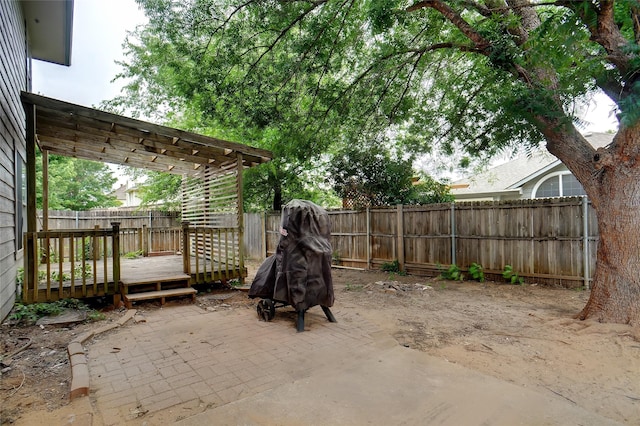 317 Stately Oak Ln, Lake Dallas, TX 75065 - fenced backyard with a deck and a patio