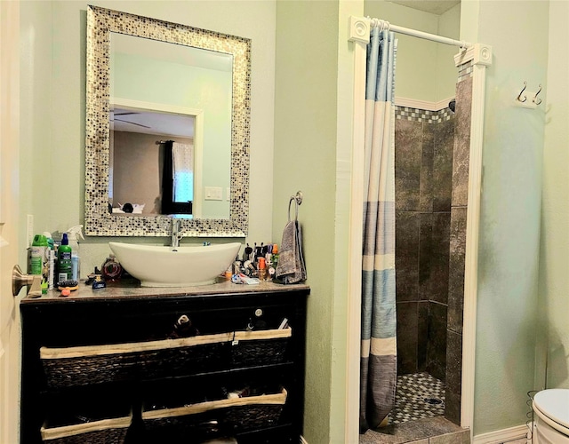 203 Hollywood St, Coleman, TX 76834 - full bath with a stall shower, vanity, and toilet