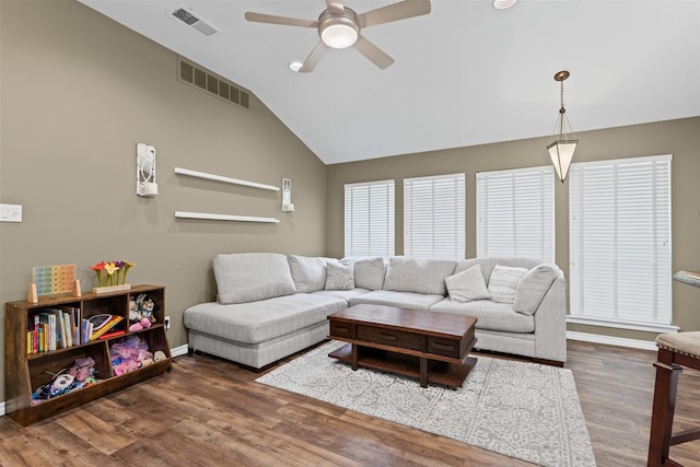 7009 Brookvale Rd, Fort Worth, TX 76132 - living room featuring a ceiling fan, vaulted ceiling, and wood finished floors
