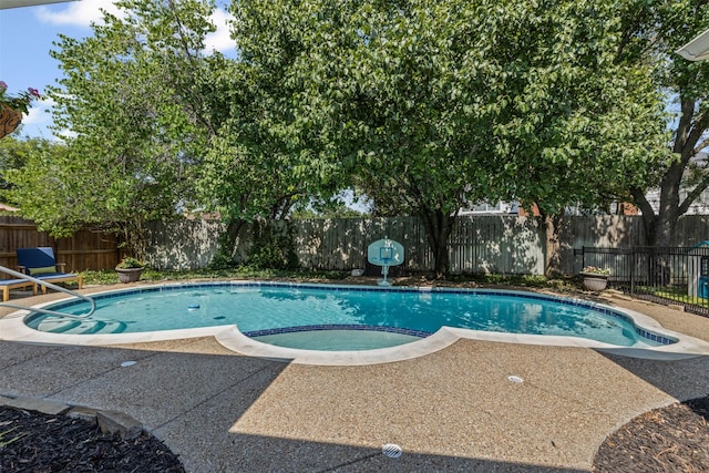 7009 Brookvale Rd, Fort Worth, TX 76132 - view of swimming pool with a fenced backyard and a patio area