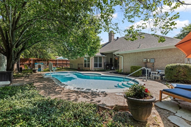7009 Brookvale Rd, Fort Worth, TX 76132 - view of swimming pool with a patio area