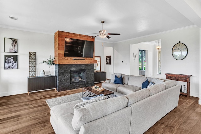 288 Ontario Loop, Sunnyvale, TX 75182 - living room with ornamental molding, wood finished floors, baseboards, a ceiling fan, and a large fireplace