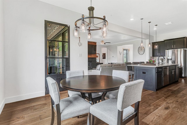 288 Ontario Loop, Sunnyvale, TX 75182 - dining space with baseboards, dark wood-style flooring, and ceiling fan