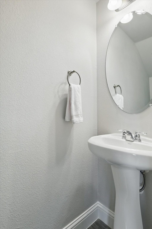 6105 Hightower St, Celina, TX 76227 - bathroom with a sink and baseboards