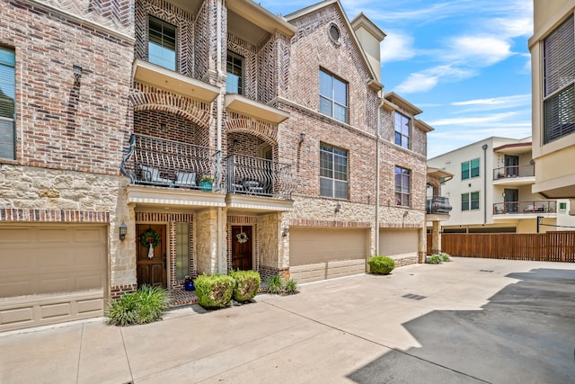 1910 Hope St Unit 15, Dallas, TX 75206 - view of property featuring a garage and driveway