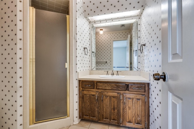 1541 Croston Dr, Plano, TX 75075 - full bathroom featuring wallpapered walls, a shower stall, vanity, and tile patterned floors