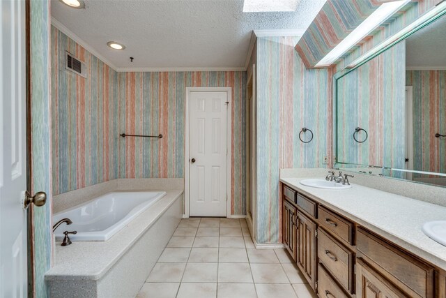 1541 Croston Dr, Plano, TX 75075 - bathroom with a bath, double vanity, tile patterned floors, a textured ceiling, and wallpapered walls