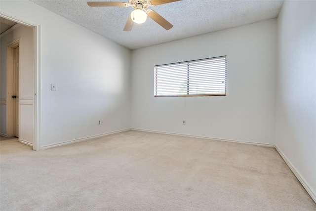 1541 Croston Dr, Plano, TX 75075 - carpeted empty room with a textured ceiling, a ceiling fan, and baseboards