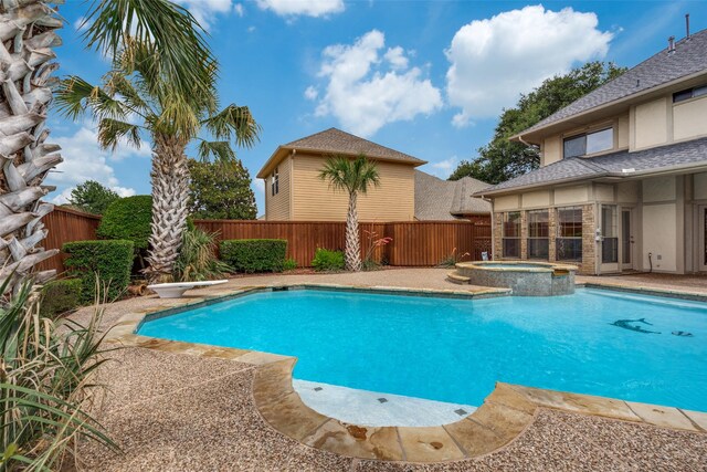 1541 Croston Dr, Plano, TX 75075 - view of swimming pool with a fenced backyard, a pool with connected hot tub, and a diving board
