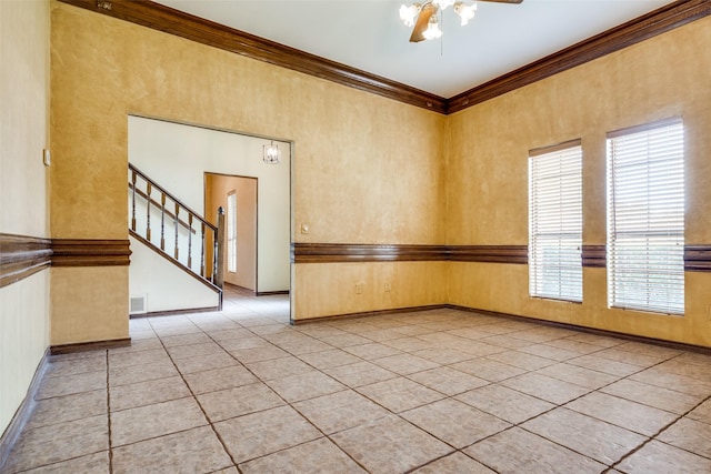 1541 Croston Dr, Plano, TX 75075 - unfurnished room with light tile patterned floors, ceiling fan, ornamental molding, stairway, and baseboards