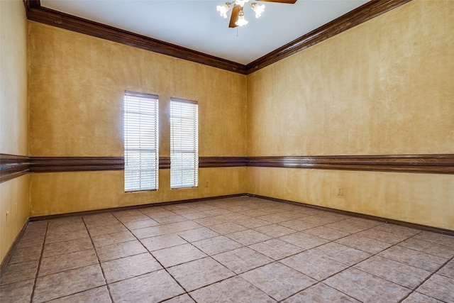 1541 Croston Dr, Plano, TX 75075 - spare room with crown molding, light tile patterned flooring, ceiling fan, and baseboards