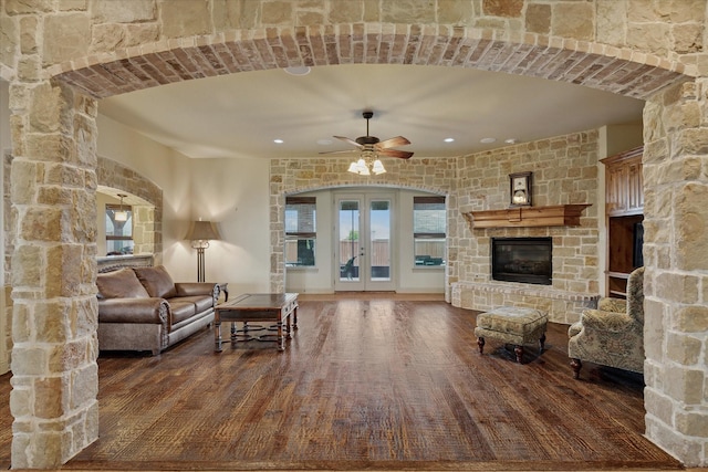 6708 Mustang Trl, Sanger, TX 76266 - living room with wood finished floors, a fireplace, a ceiling fan, and recessed lighting