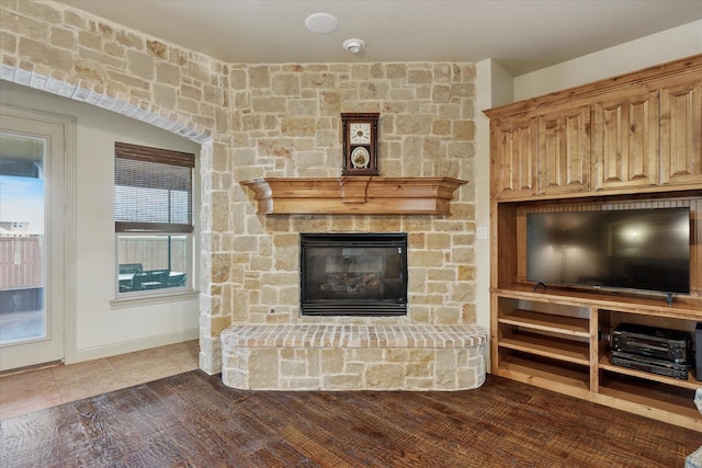 6708 Mustang Trl, Sanger, TX 76266 - unfurnished living room with a stone fireplace