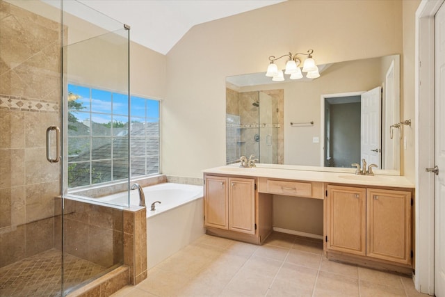 10120 Preston Vineyard Dr, Frisco, TX 75035 - bathroom featuring a bath, double vanity, a stall shower, vaulted ceiling, and tile patterned flooring