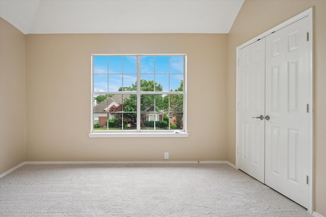 10120 Preston Vineyard Dr, Frisco, TX 75035 - unfurnished bedroom featuring carpet flooring, baseboards, a closet, and vaulted ceiling