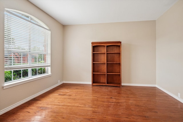 10120 Preston Vineyard Dr, Frisco, TX 75035 - empty room featuring wood finished floors and baseboards