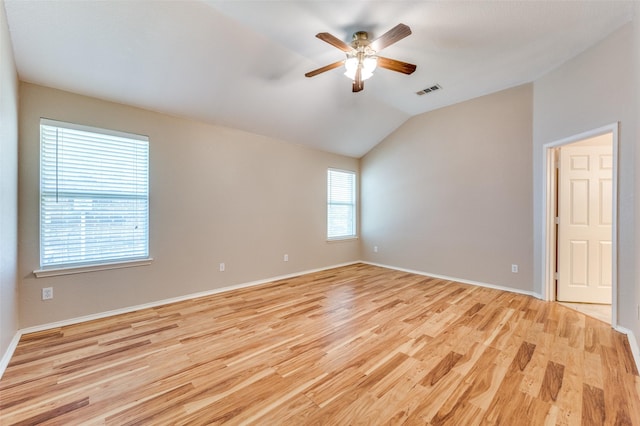 1117 Red Hawk Dr, Frisco, TX 75033 - empty room featuring light wood-style flooring, ceiling fan, lofted ceiling, and baseboards