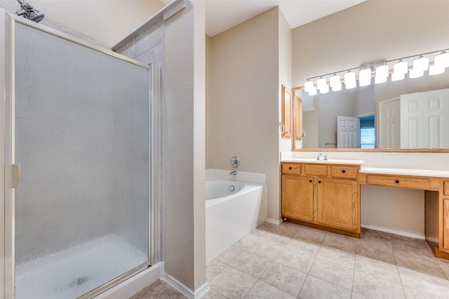 1117 Red Hawk Dr, Frisco, TX 75033 - bathroom featuring a shower stall, vanity, a bath, and tile patterned flooring