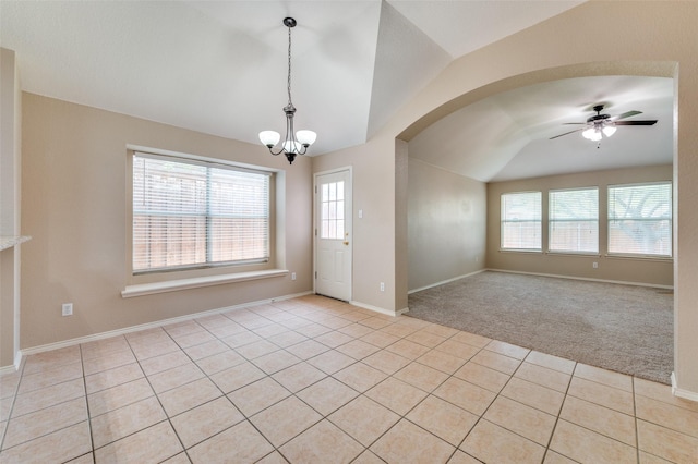 1117 Red Hawk Dr, Frisco, TX 75033 - unfurnished room with vaulted ceiling, a chandelier, light carpet, light tile patterned floors, and a ceiling fan