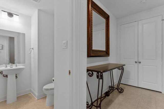 2788 Walker Way, Northlake, TX 76247 - bathroom with tile patterned flooring, toilet, and baseboards