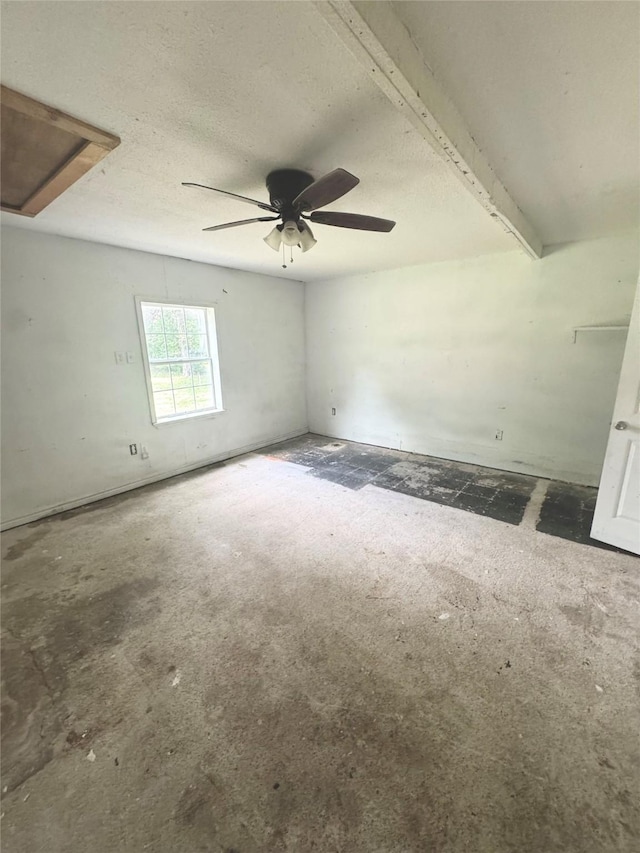 601 Elm St, Teague, TX 75860 - empty room featuring a ceiling fan and a textured ceiling