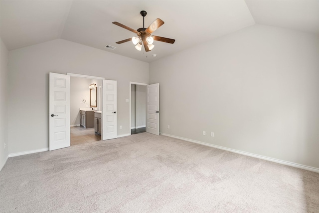 2627 Askern Ct, Grand Prairie, TX 75052 - unfurnished bedroom featuring lofted ceiling, light carpet, ensuite bathroom, baseboards, and ceiling fan