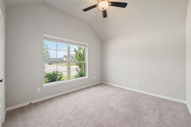 2627 Askern Ct, Grand Prairie, TX 75052 - spare room with lofted ceiling, ceiling fan, carpet flooring, and baseboards
