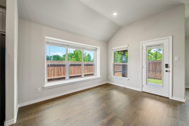 2627 Askern Ct, Grand Prairie, TX 75052 - empty room with lofted ceiling, baseboards, dark wood finished floors, and recessed lighting