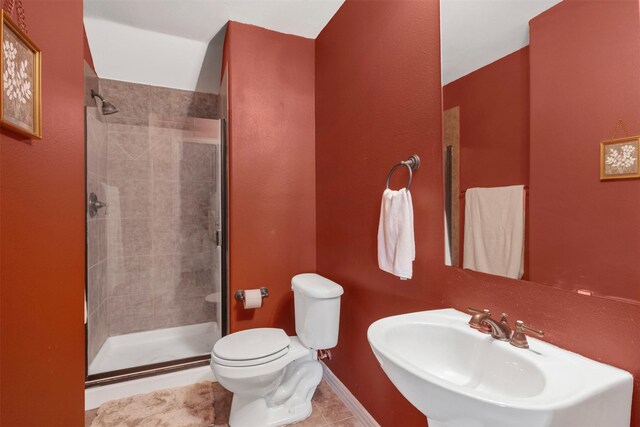 217 Silver Rose Blvd, Burleson, TX 76028 - full bath with toilet, a stall shower, a sink, tile patterned floors, and baseboards